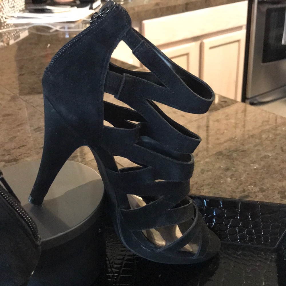 Connie black suede Crisscross peep toe pumps.